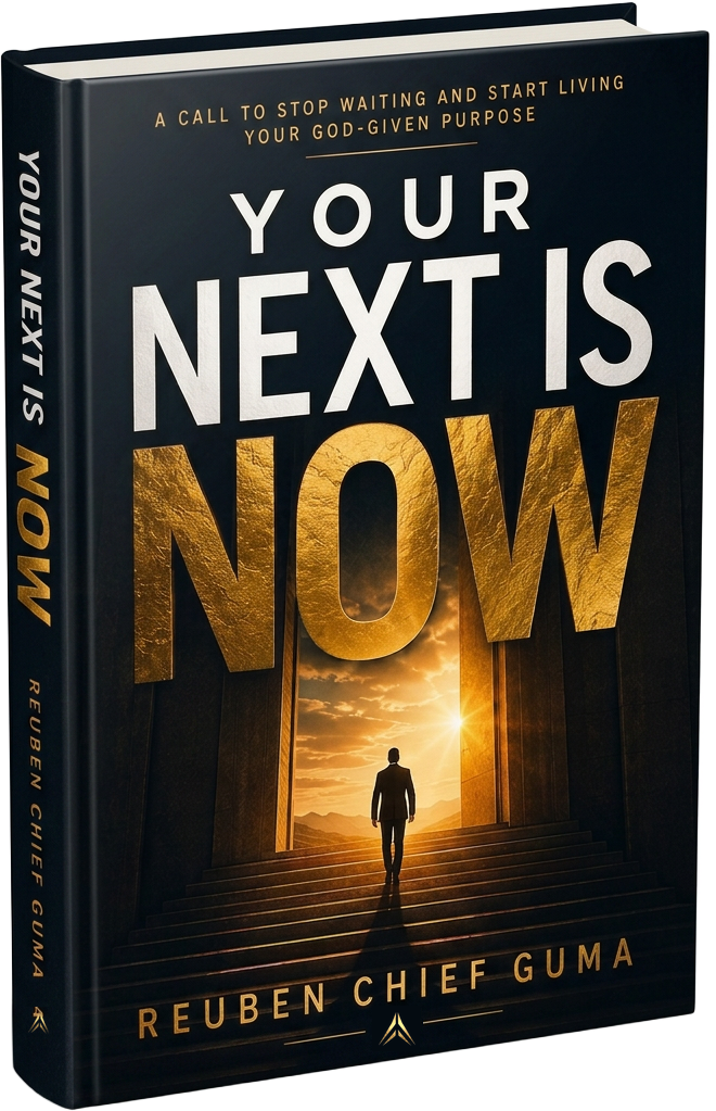 Book cover of Your Next Is Now by Reuben Chief Guma — a navy and gold hardcover from Inner Compass Publishing on stepping into your next chapter.